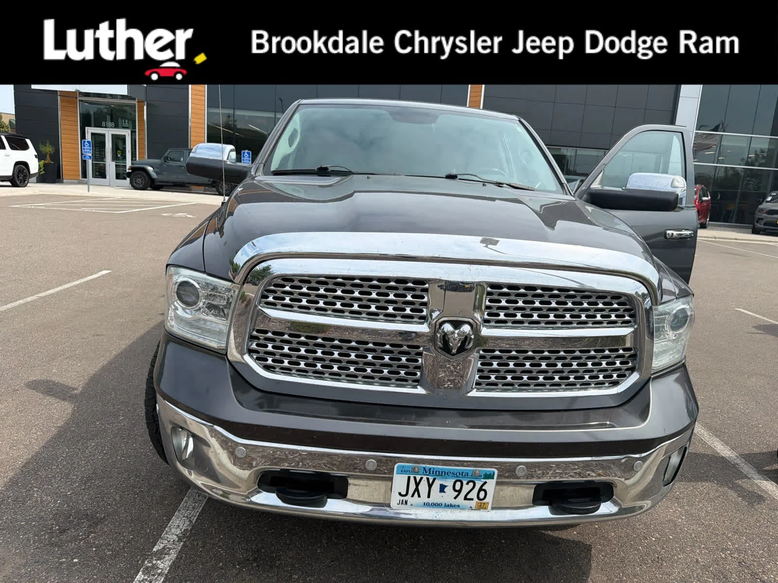 Used 2014 Granite Crystal Metallic Clearcoat Ram Laramie image 1