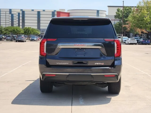 Used 2023 TITANIUM RUSH METALLIC GMC AT4 image 6