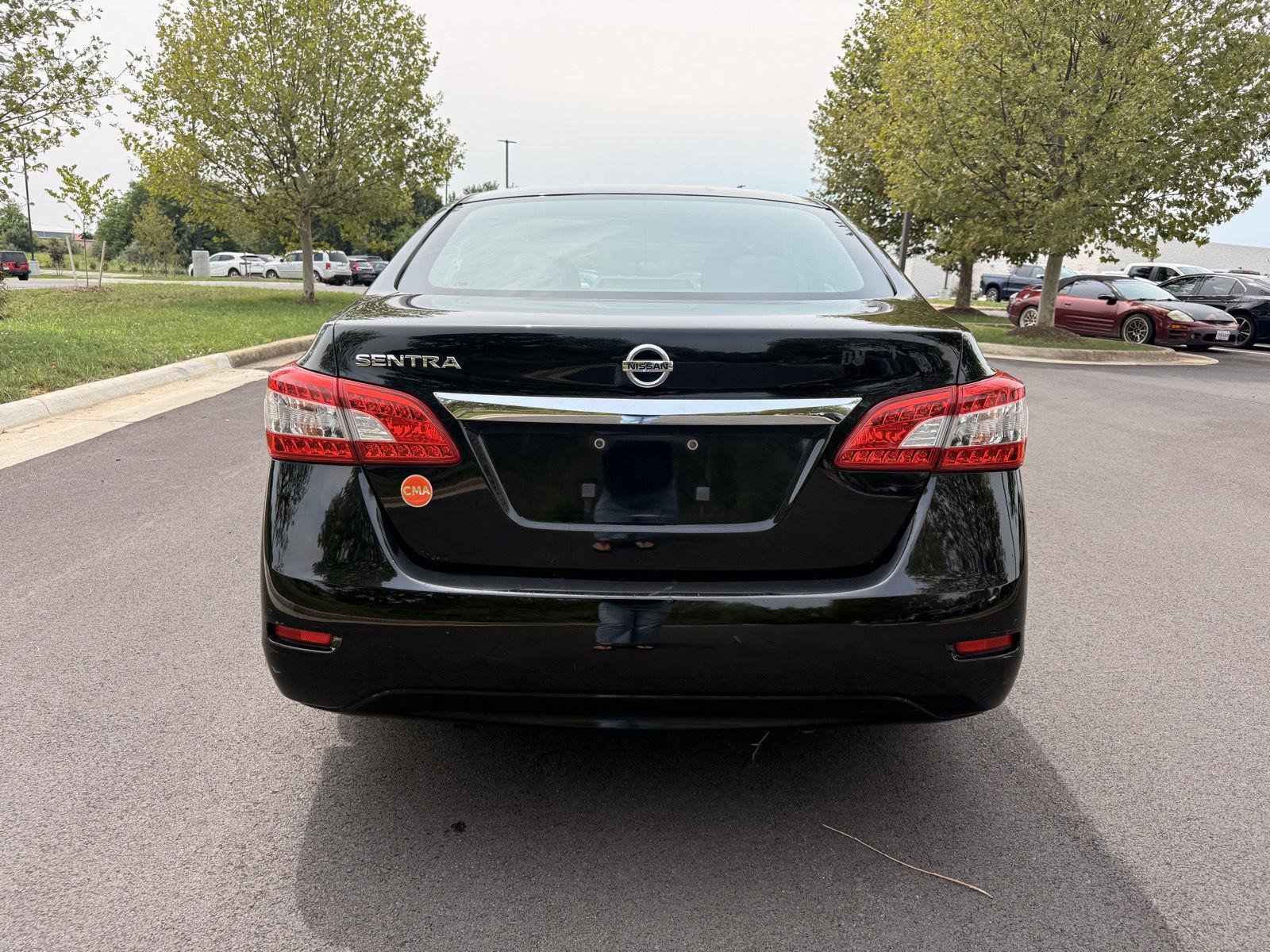 Used 2015 Super Black Nissan S image 6