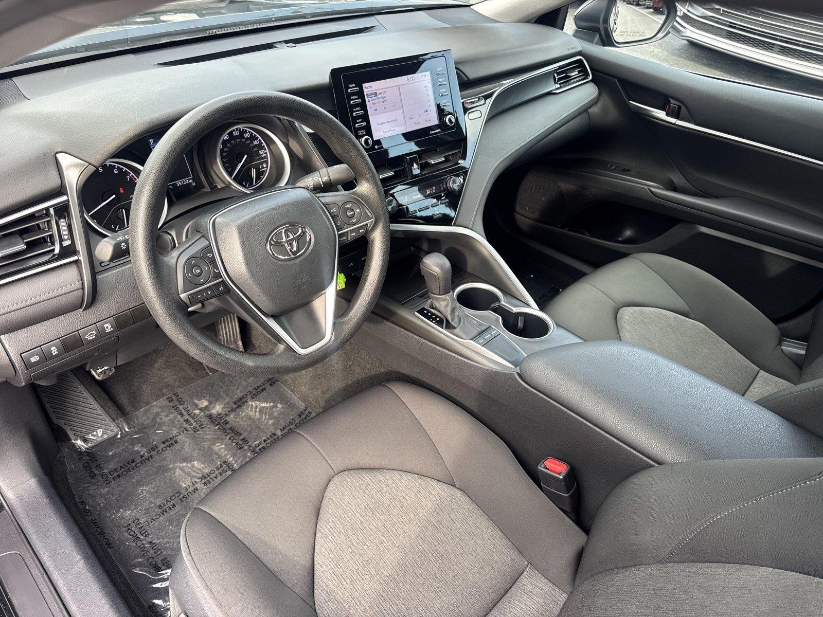 Used 2024 Midnight Black Metallic Toyota LE image 8