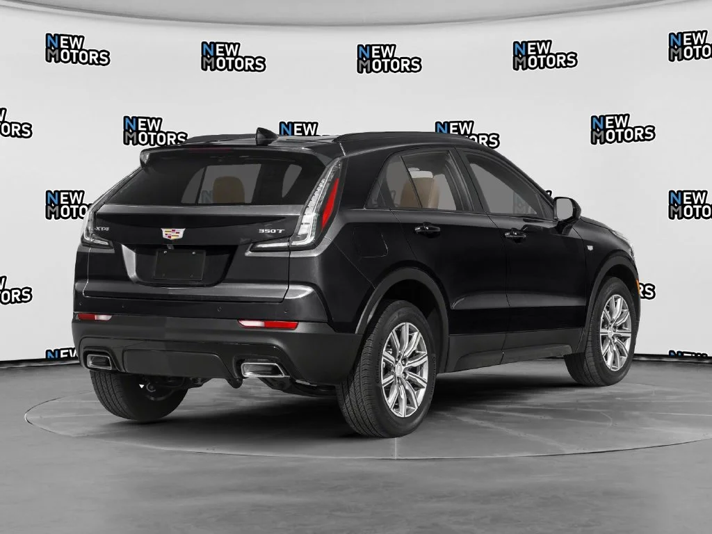 Used 2019 Black Metallic Cadillac Sport image 2