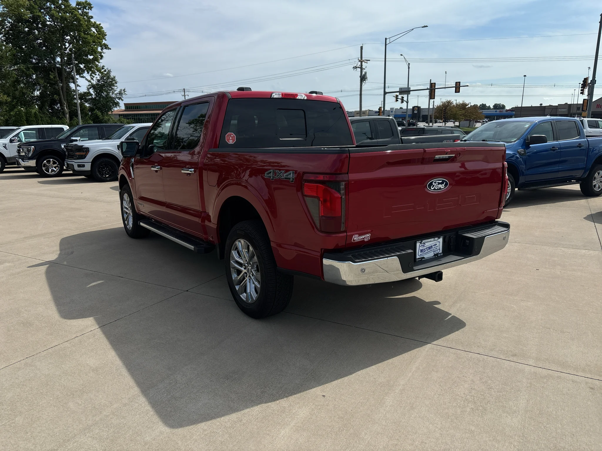 Used 2024 Rapid Red Metallic Tinted Clearcoat Ford XLT image 5