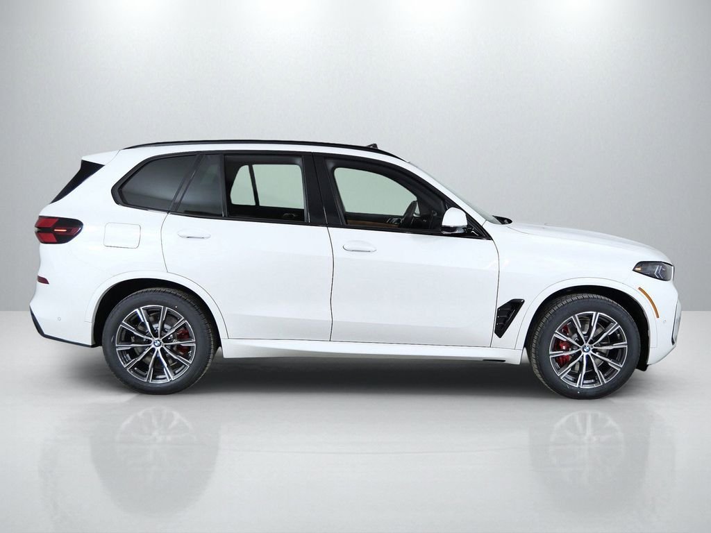 Used 2026 Mineral White Metallic BMW xDrive50e image 9