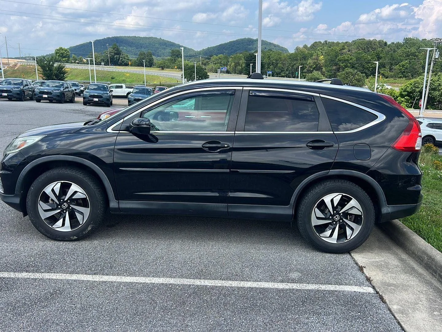 Used 2015 Crystal Black Pearl Honda Touring image 2