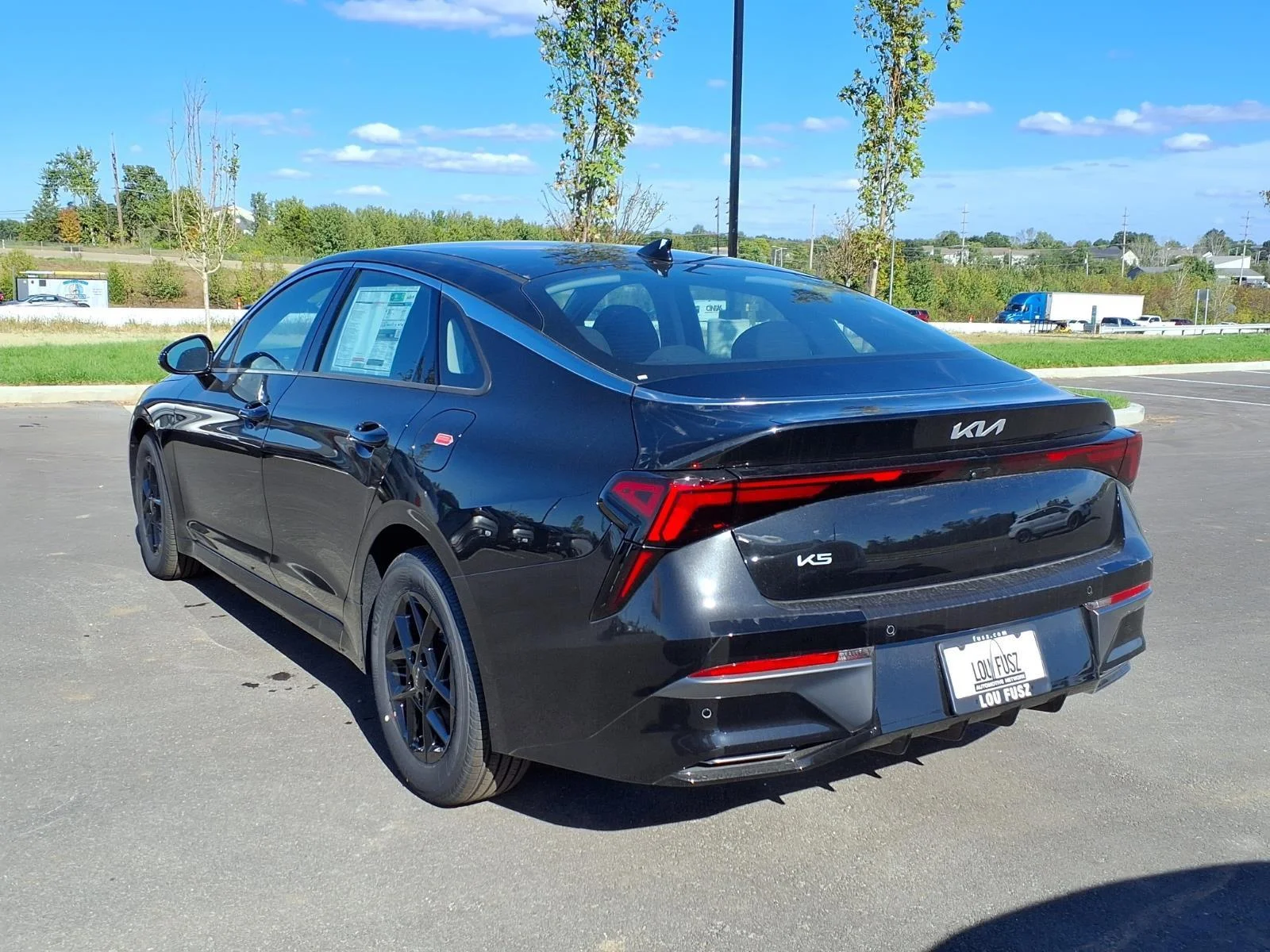 New 2026 Aurora Black Pearl Kia LXS FWD image 2