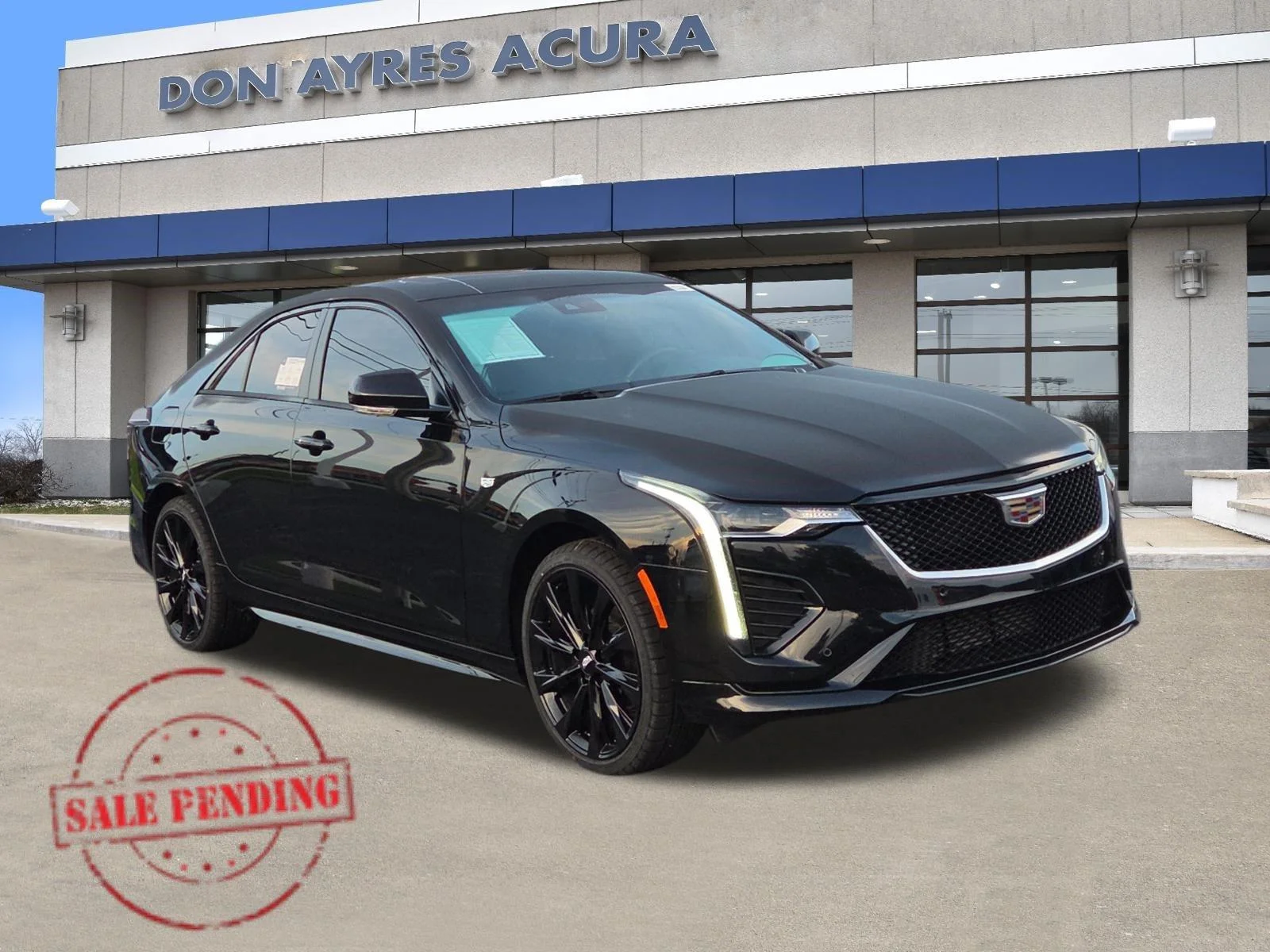 Used 2023 Black Raven Cadillac Sport image 1