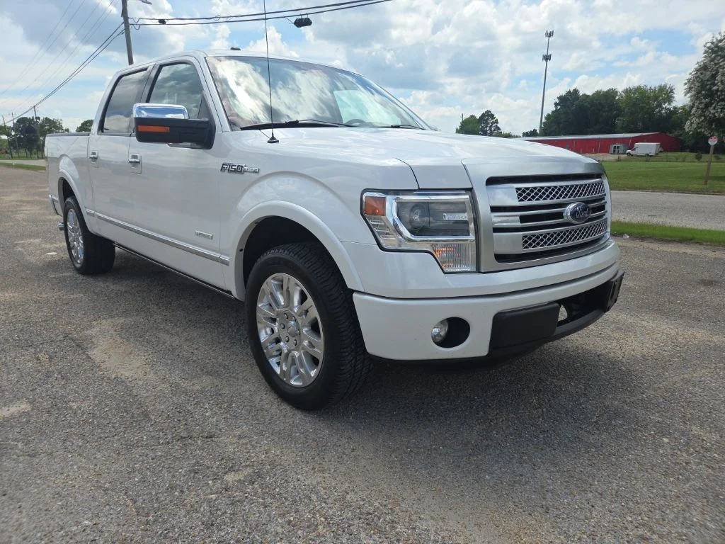 Used 2013 White Ford Platinum image 1