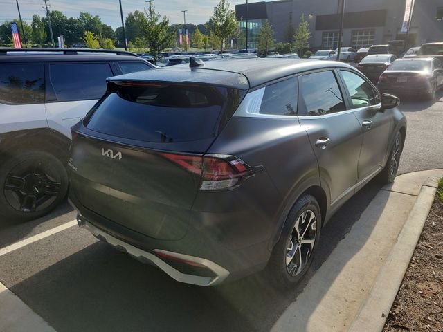 Used 2024 Ebony Black Kia EX image 4