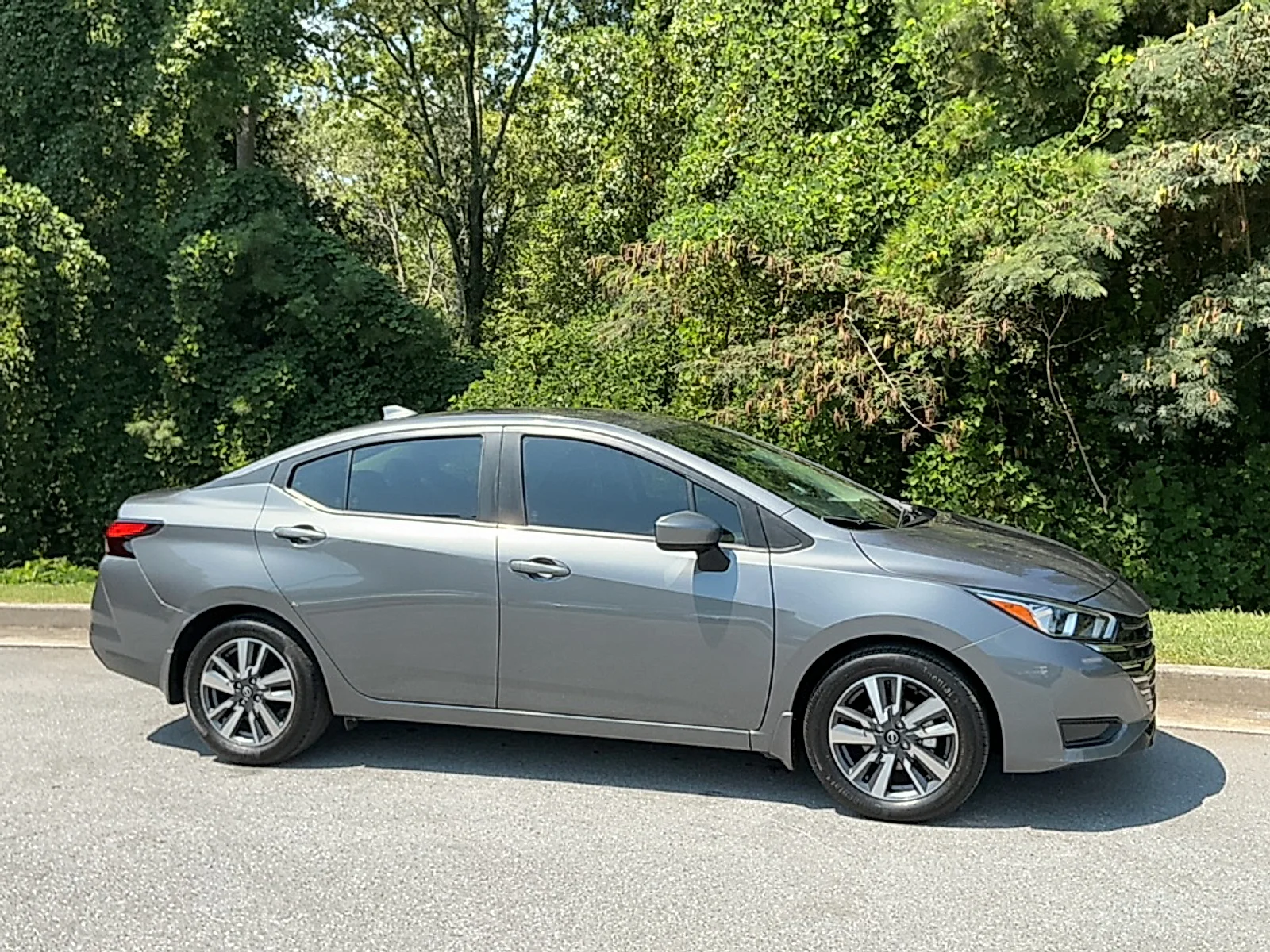 Used 2024 Gun Metallic Nissan 1.6 SV image 1