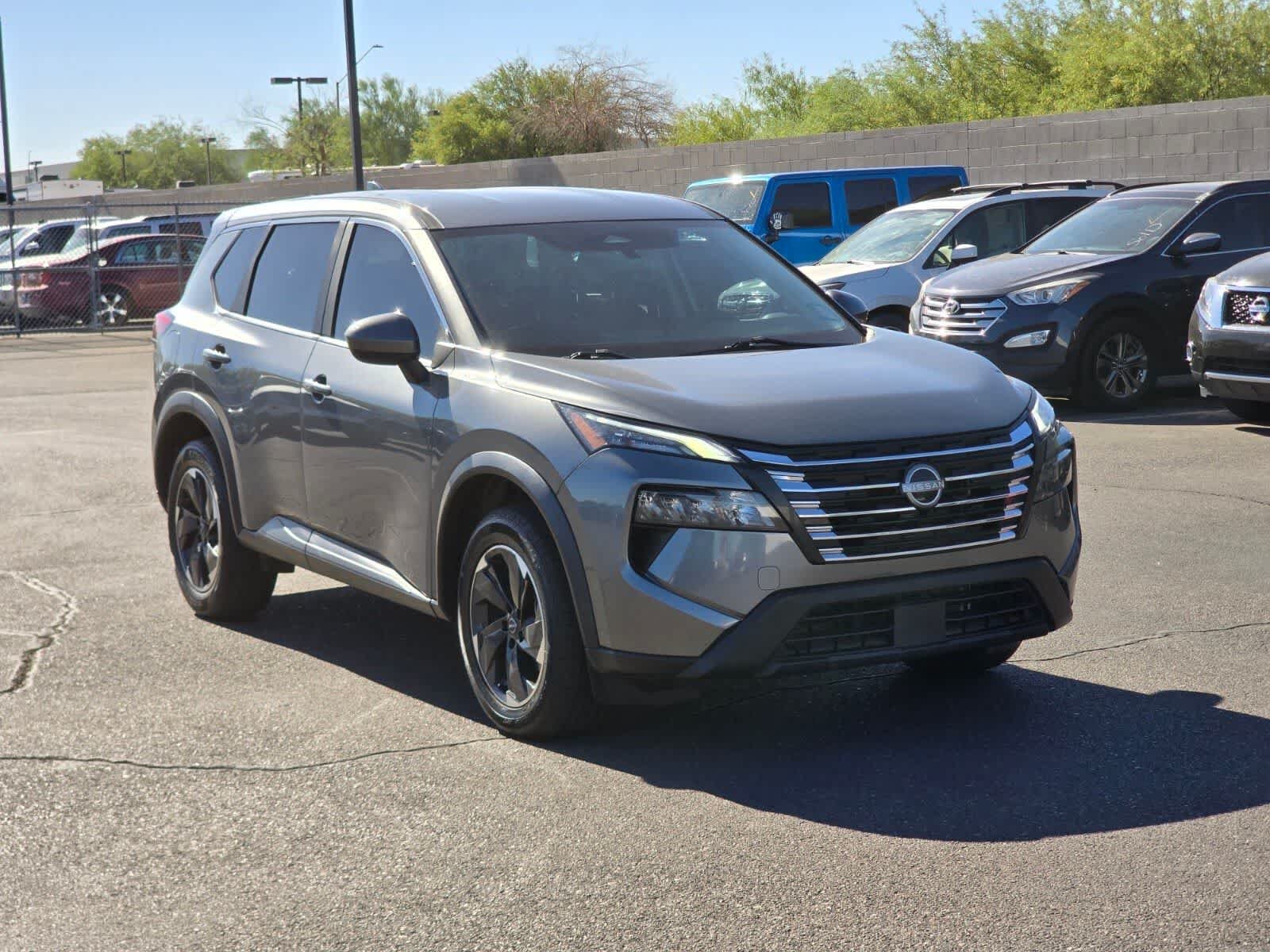 Used 2024 Gun Metallic Nissan SV image 8