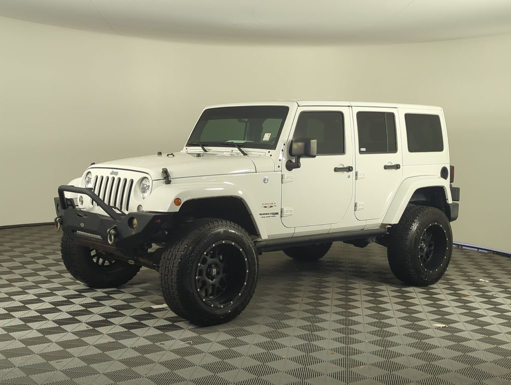 Used 2018 White Jeep Unlimited Sahara image 1