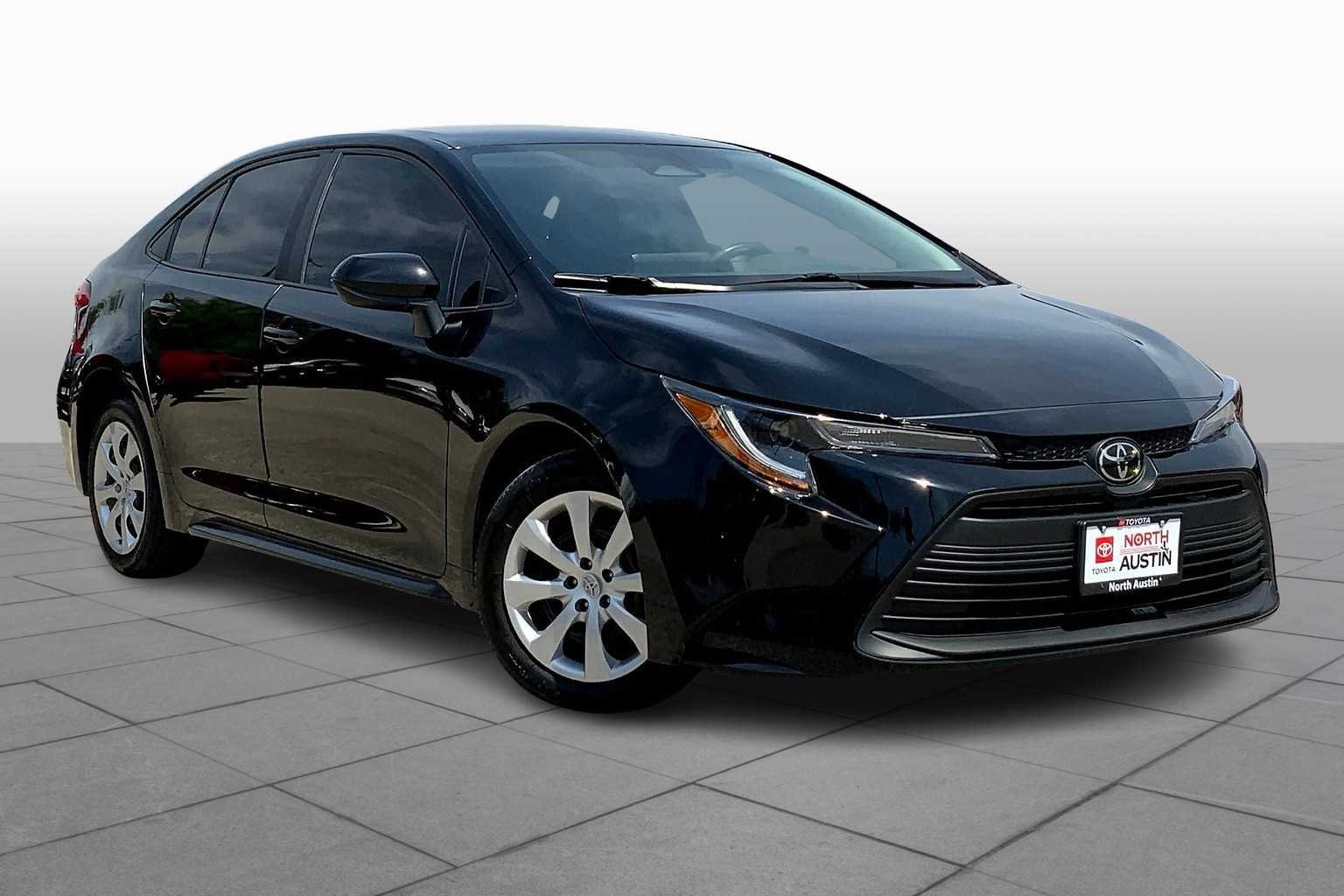 Used 2023 Midnight Black Metallic Toyota LE image 3
