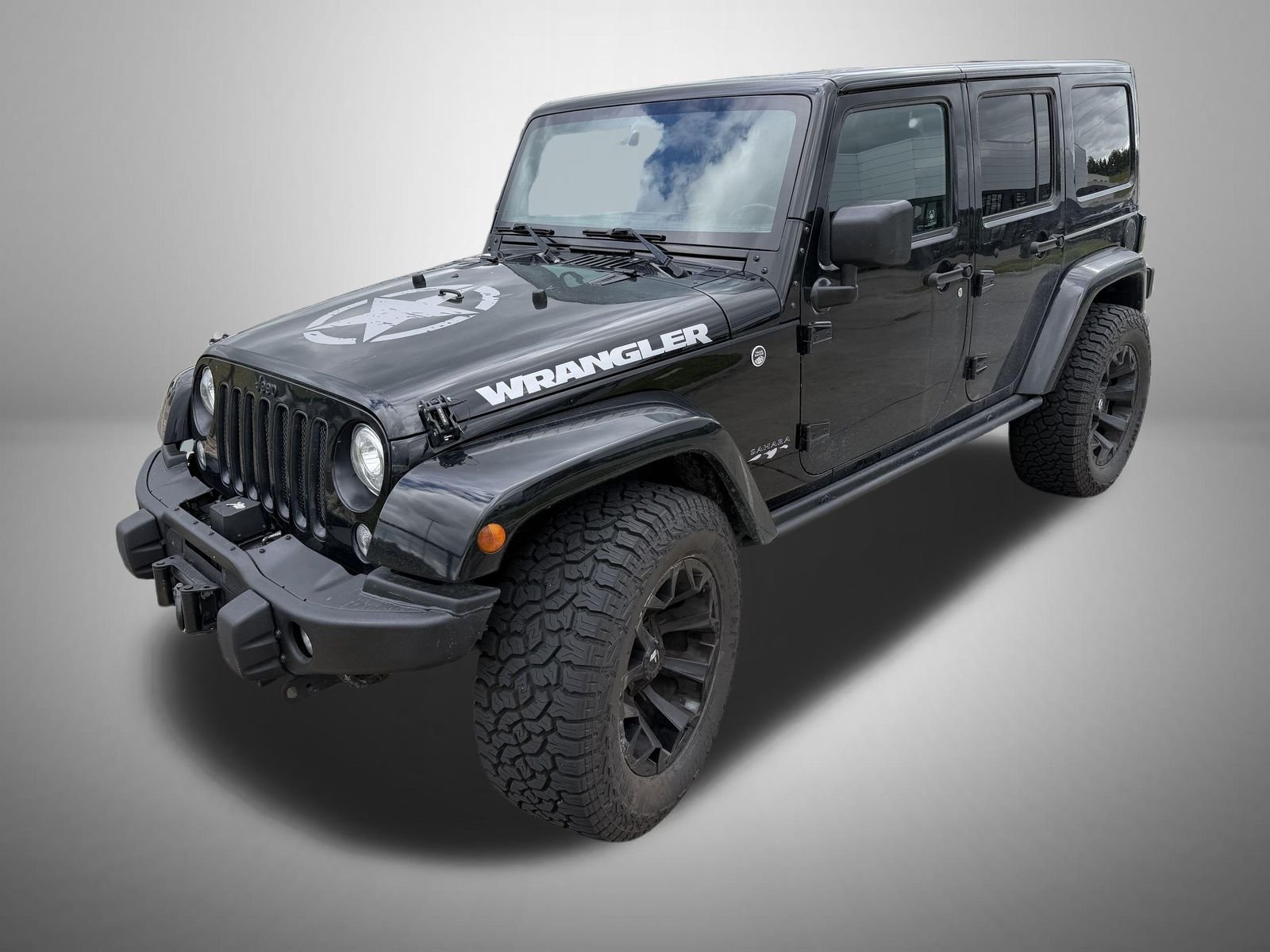 Used 2017 Black Jeep Unlimited Sahara image 1