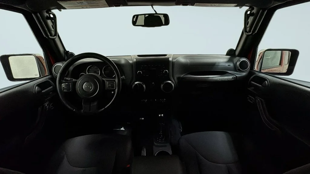 Used 2014 Orange Jeep Unlimited Sport image 7