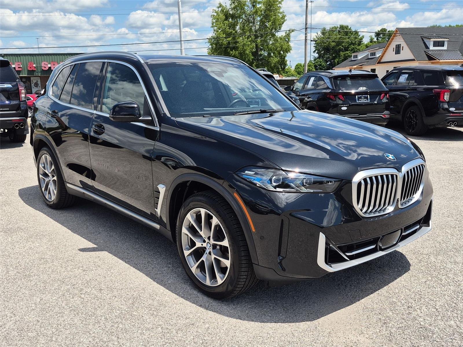 Used 2024 Black Sapphire Metallic BMW xDrive40i image 7