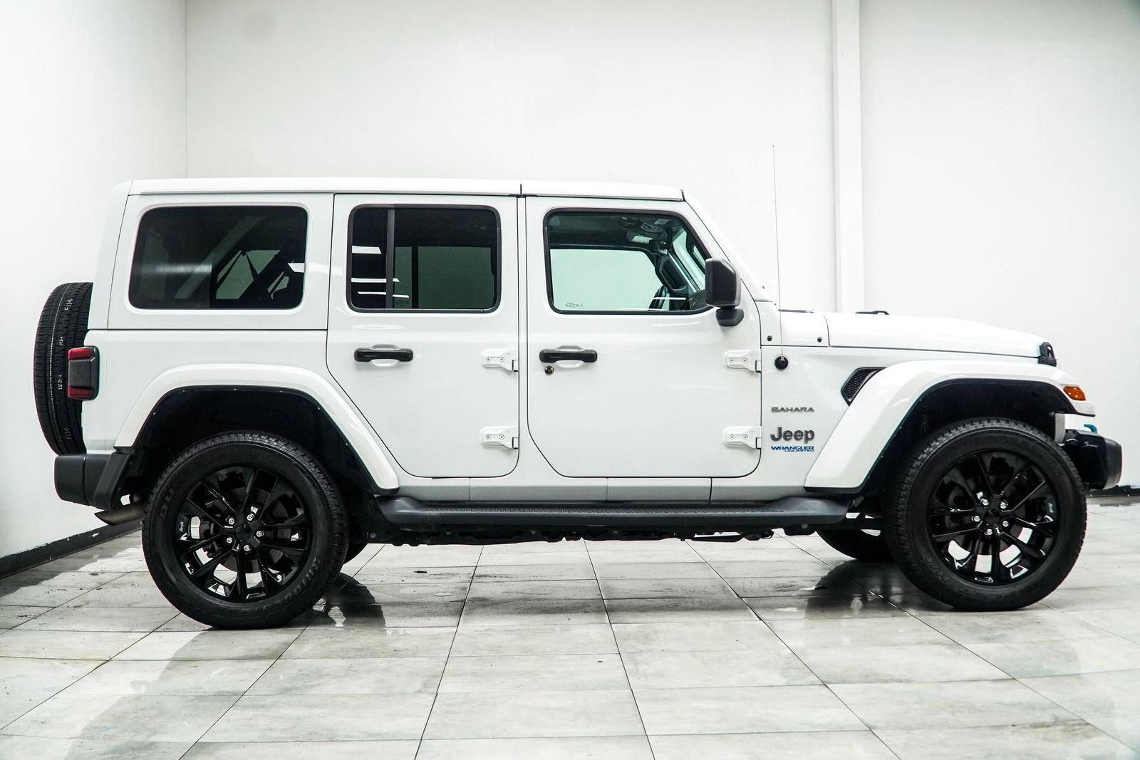 Used 2021 White Jeep Unlimited Sahara 4xe image 9