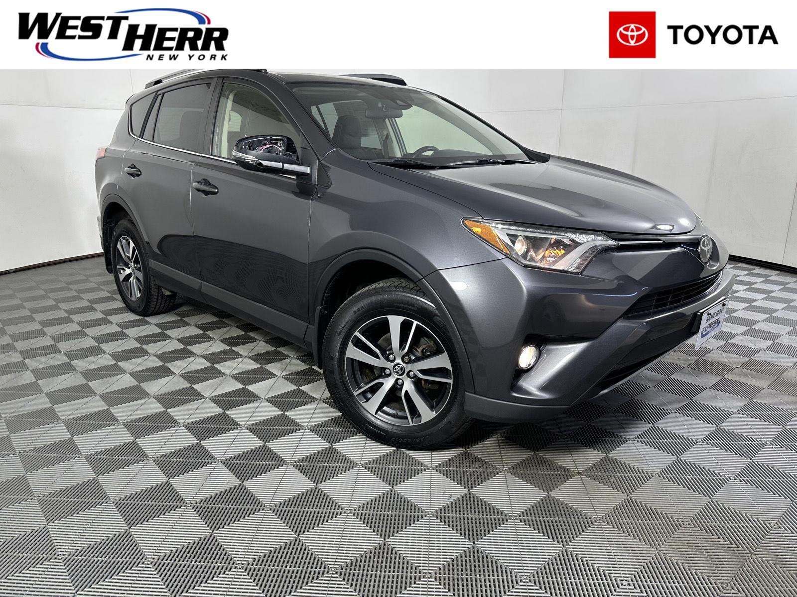 Used 2018 Magnetic Gray Metallic Toyota XLE image 1