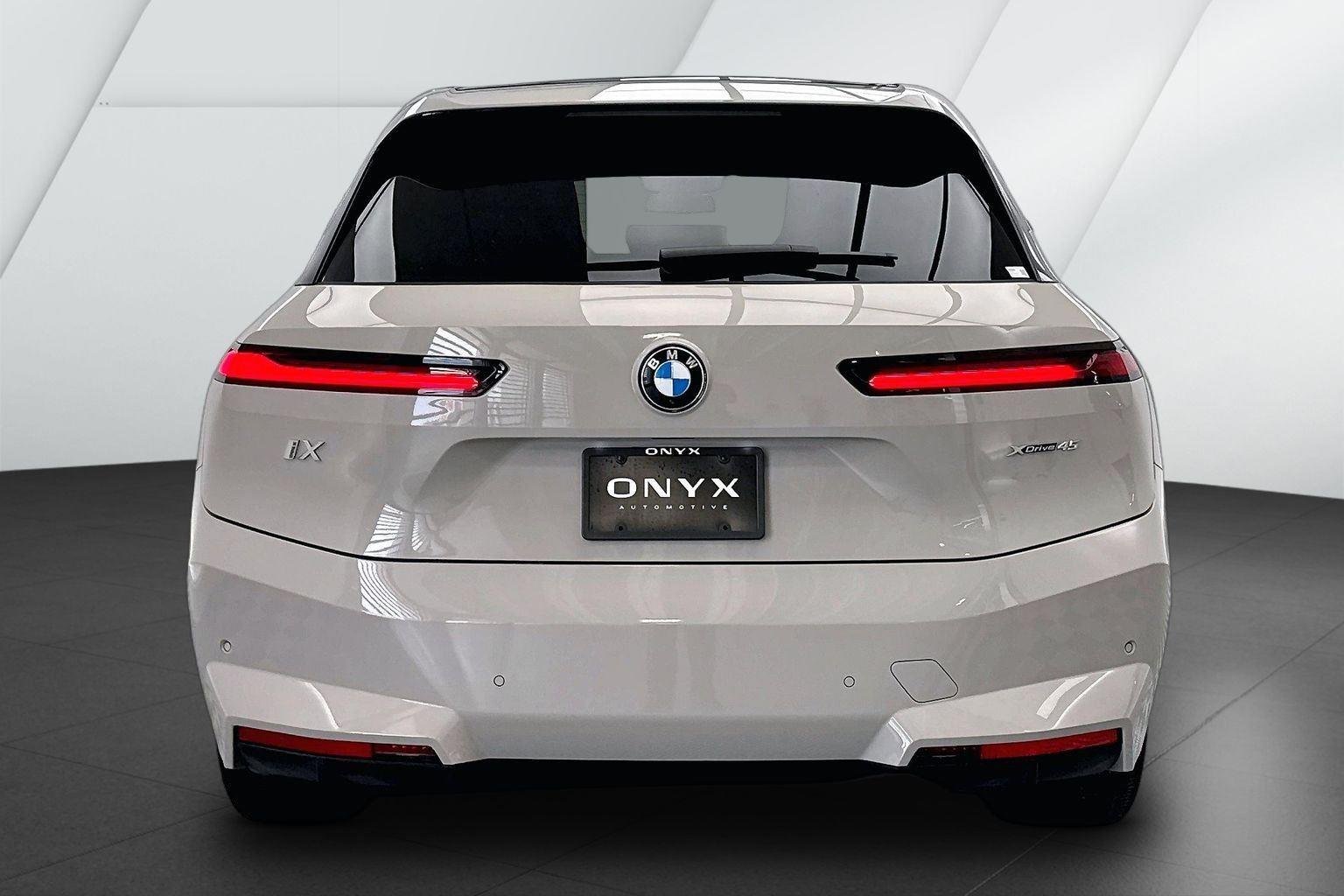Used 2026 Dune Grey Metallic BMW xDrive45 image 7