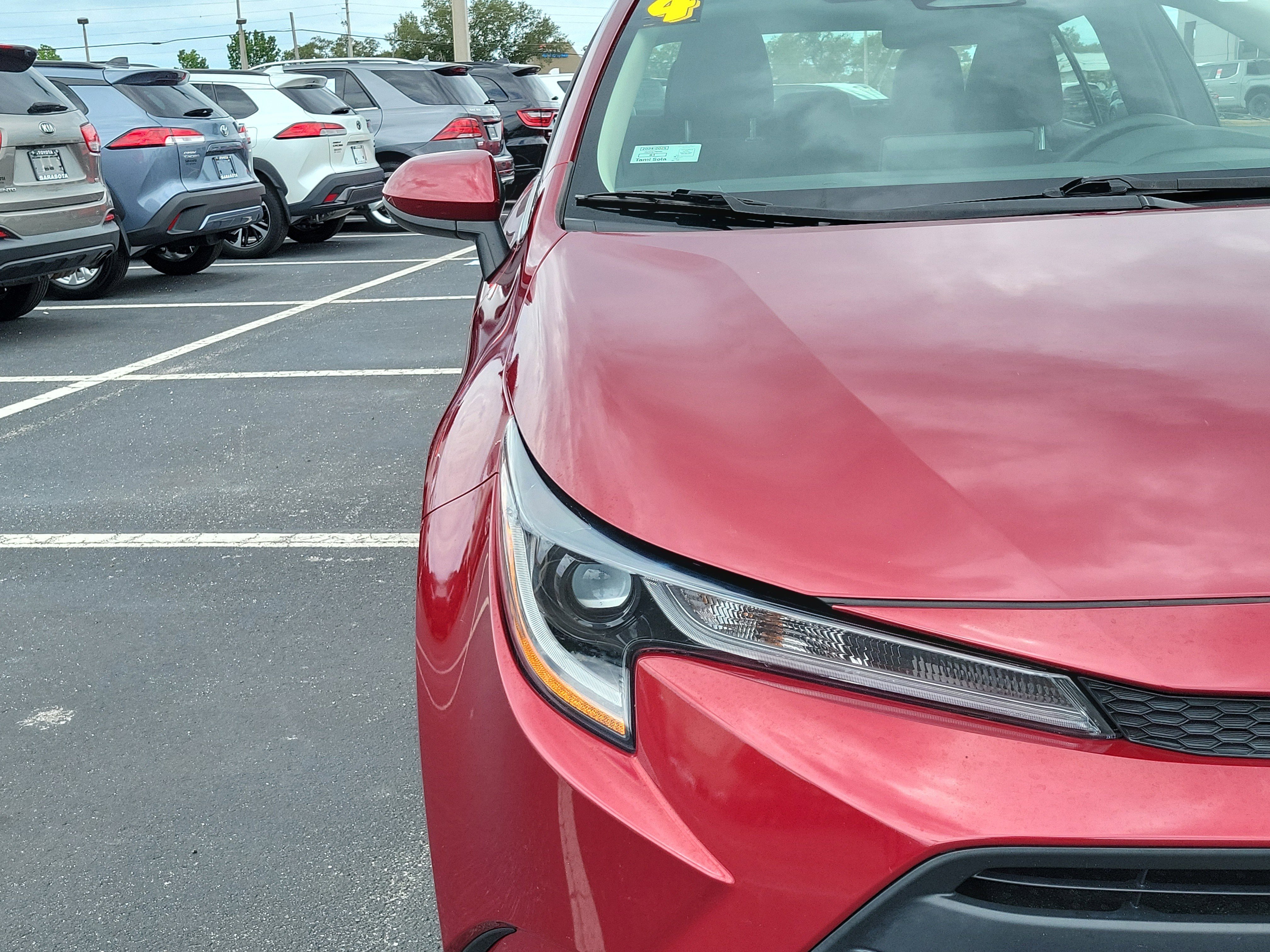 Used 2024 Ruby Flare Pearl Toyota LE image 6