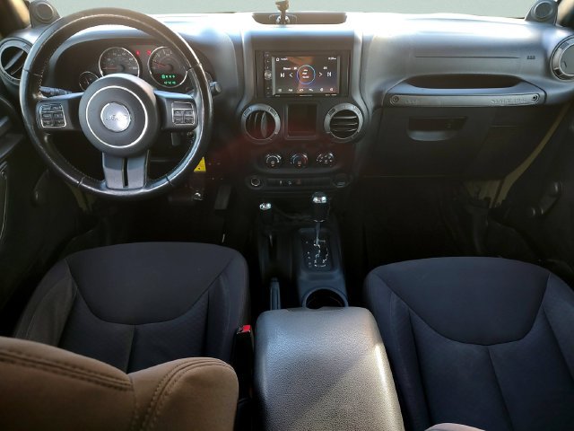 Used 2013 Green Jeep Unlimited Sport image 9