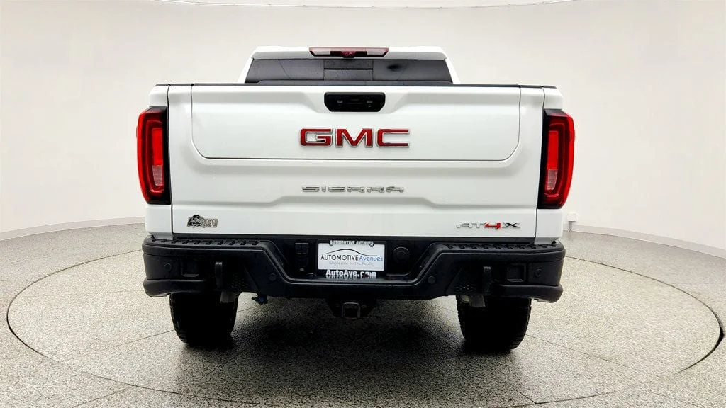 Used 2024 Summit White GMC 4WD Crew Cab 147"" AT4X image 6