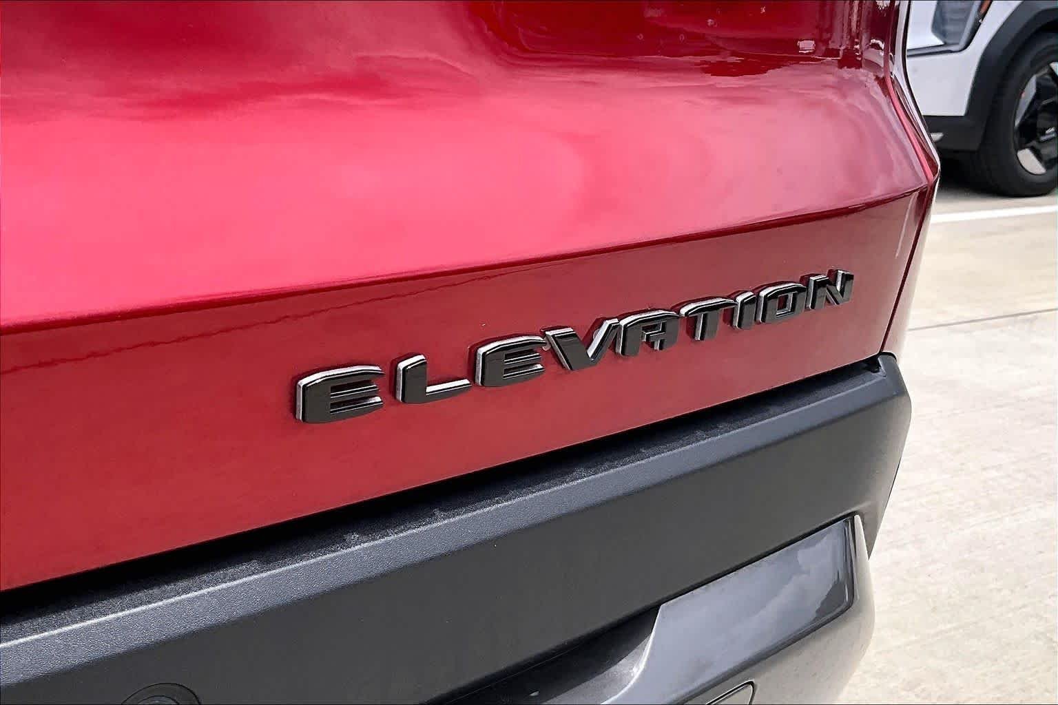 Used 2026 Volcanic Red Tintcoat GMC FWD Elevation image 10