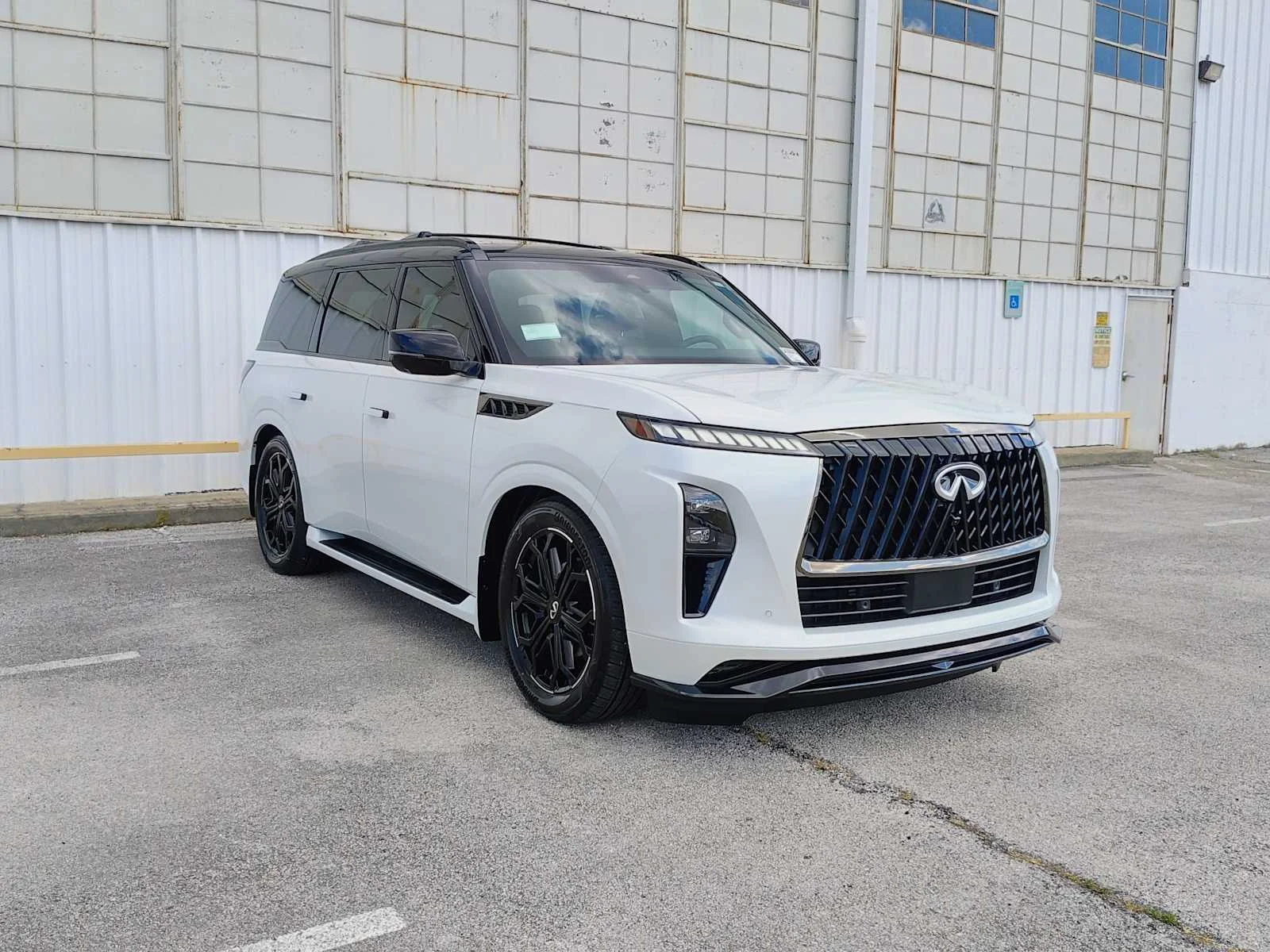 New 2026 RADIANT WHITE INFINITI Sport 4WD image 4