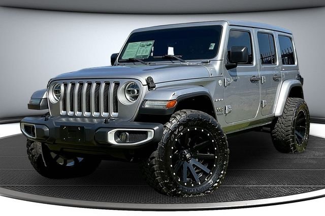 Used 2020 Silver Jeep Unlimited Sahara image 1