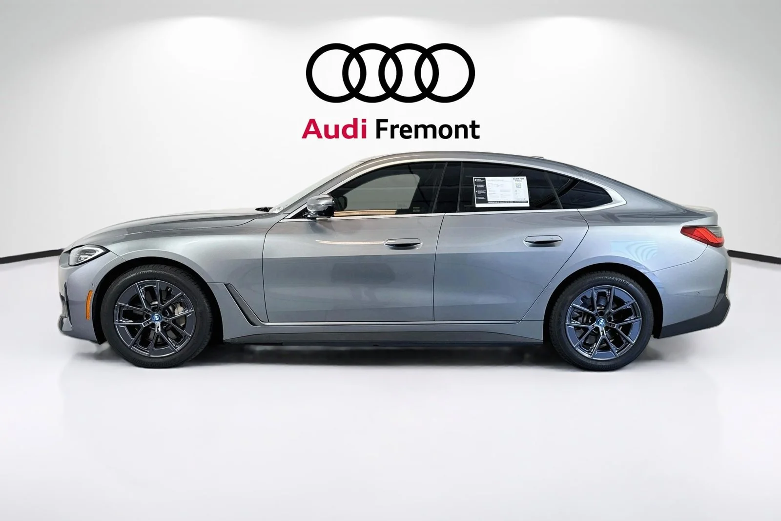 Used 2023 Skyscraper Grey Metallic BMW eDrive40 image 1