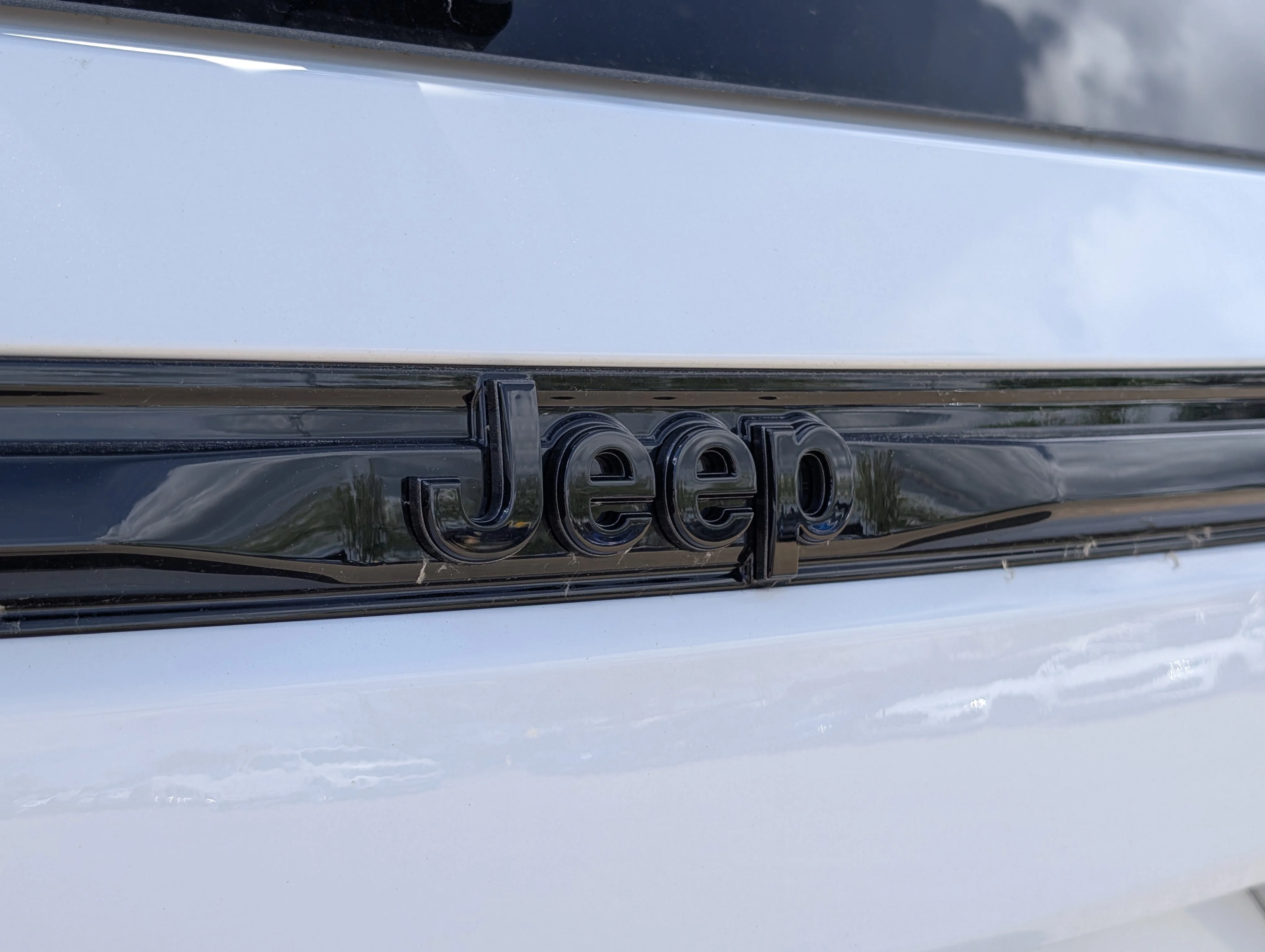 New 2025 Bright White Jeep Altitude image 14