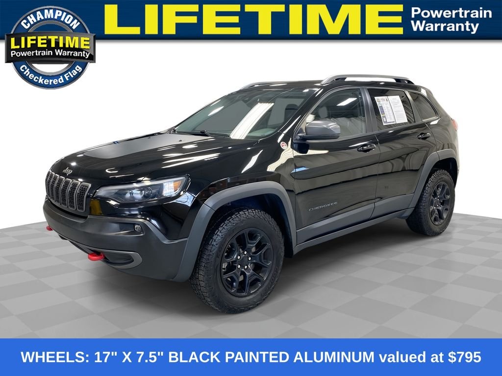 Used 2021 Diamond Black Jeep Trailhawk image 1