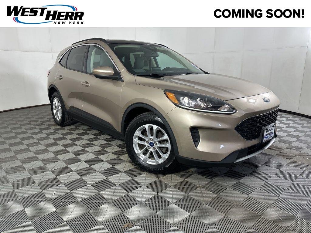 Used 2020 Desert Gold Metallic Ford SE image 1