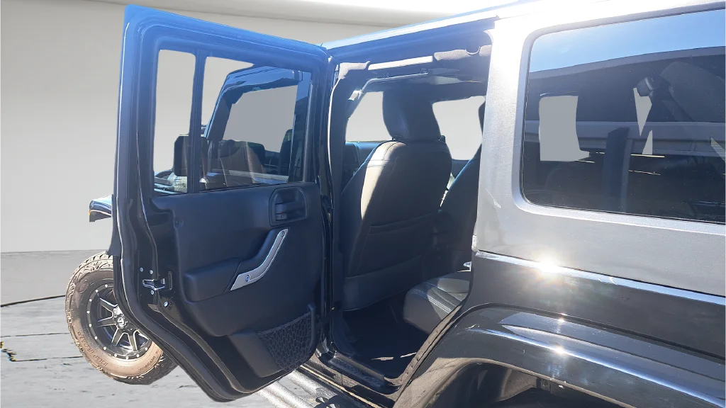 Used 2015 Black Jeep Unlimited Sahara image 10