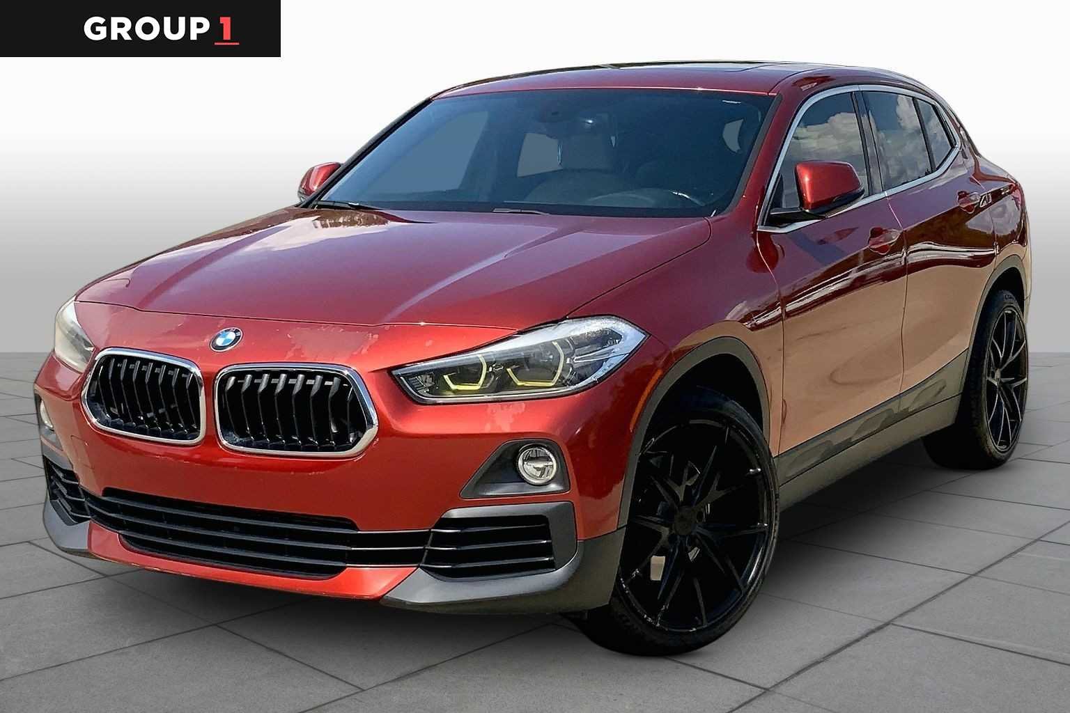 Used 2018 Sunset Orange Metallic BMW sDrive28i image 1