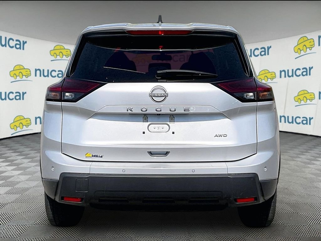 Used 2024 Brilliant Silver Metallic Nissan S image 5