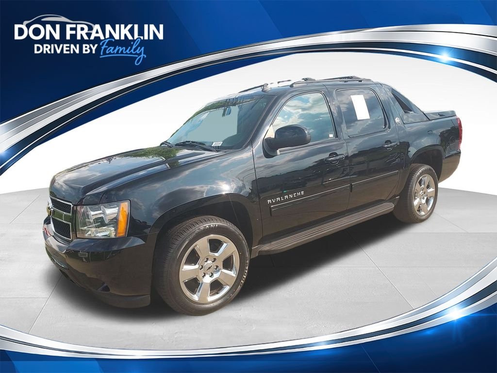 Used 2013 Black Chevrolet LS image 1