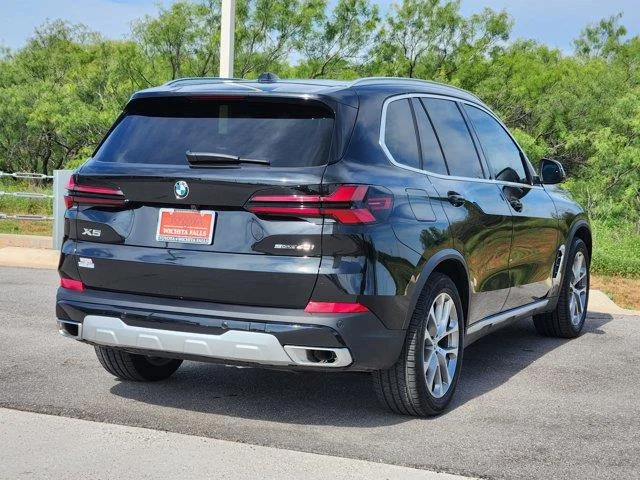 Used 2026 Black Sapphire BMW sDrive40i 4x2 Sports Activity Vehicle image 7
