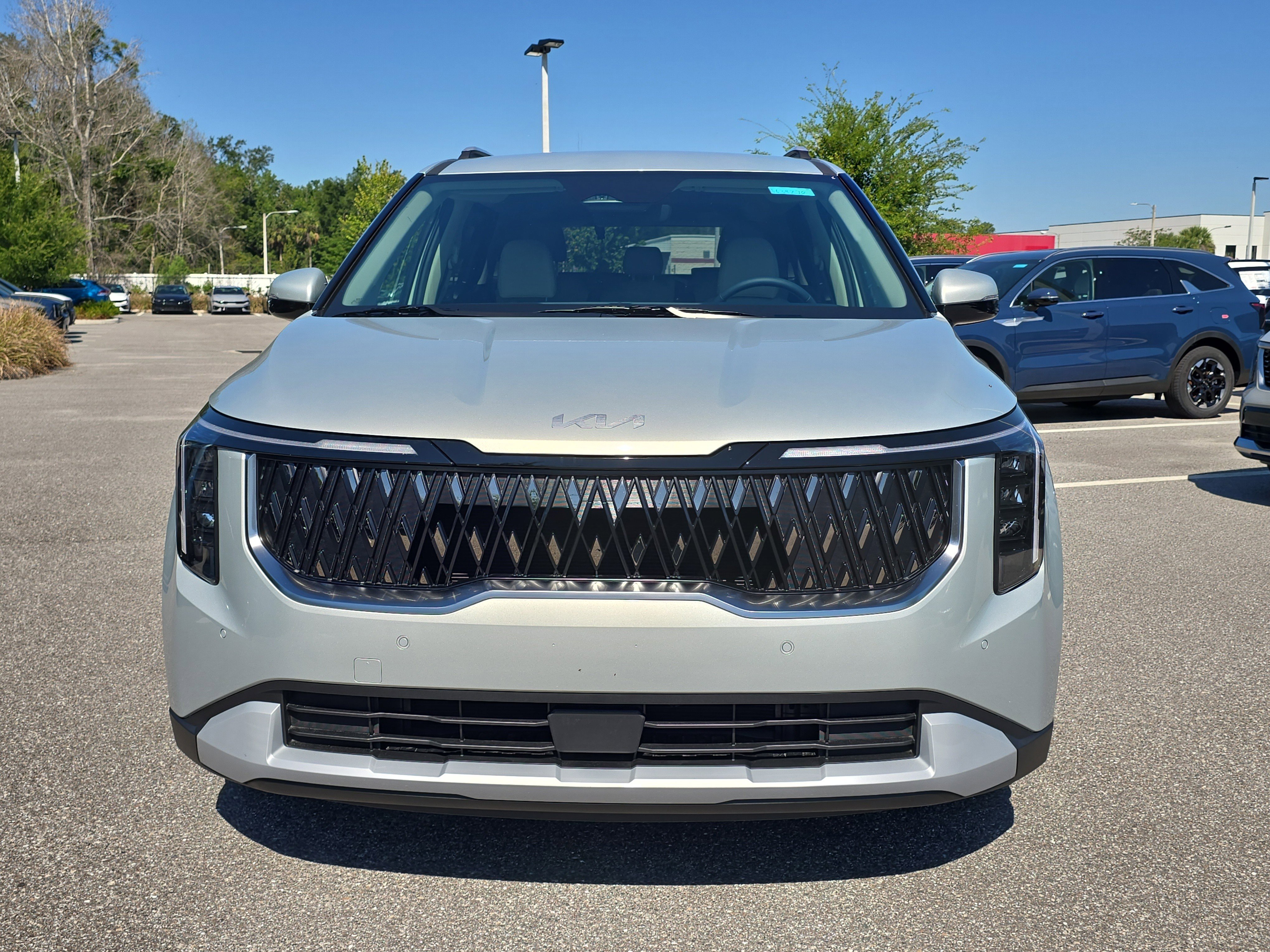 New 2026 Ivory Silver Kia EX image 3