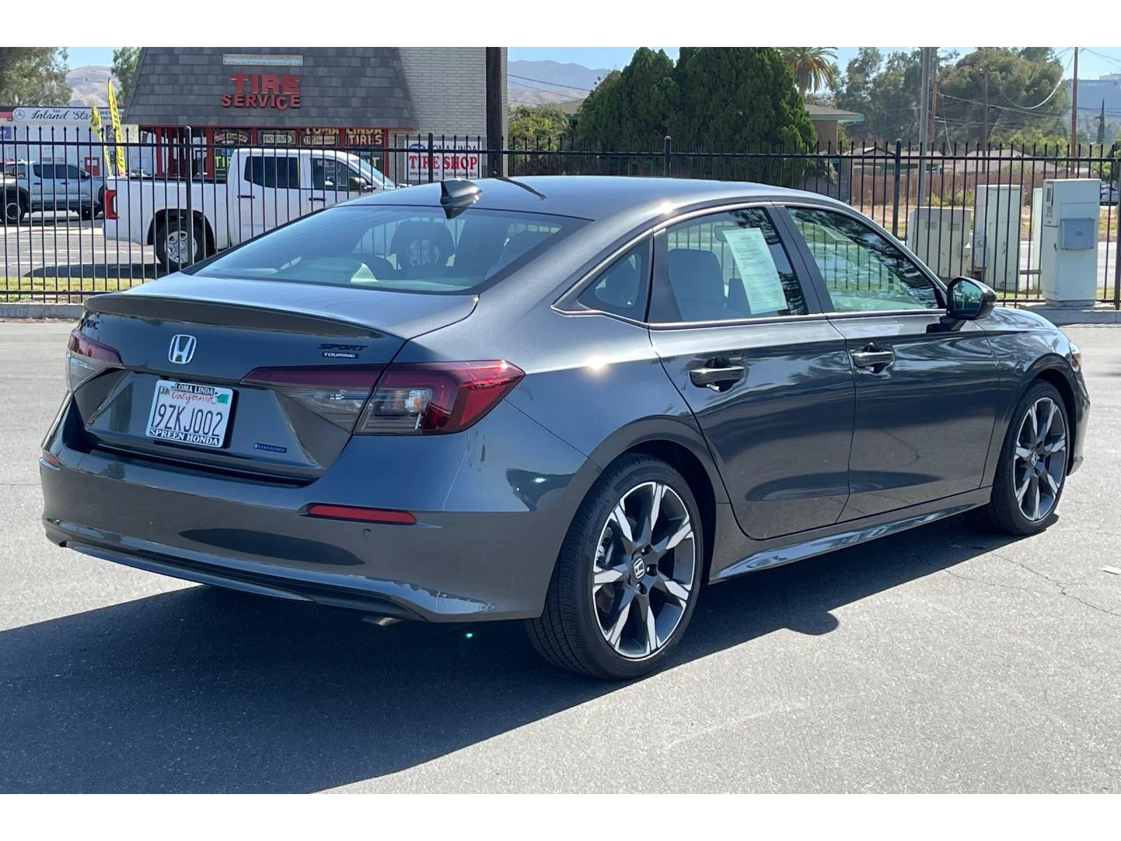 Certified Used 2026 Meteorite Gray Metallic Honda 2WD Sport Touring Hybrid image 6