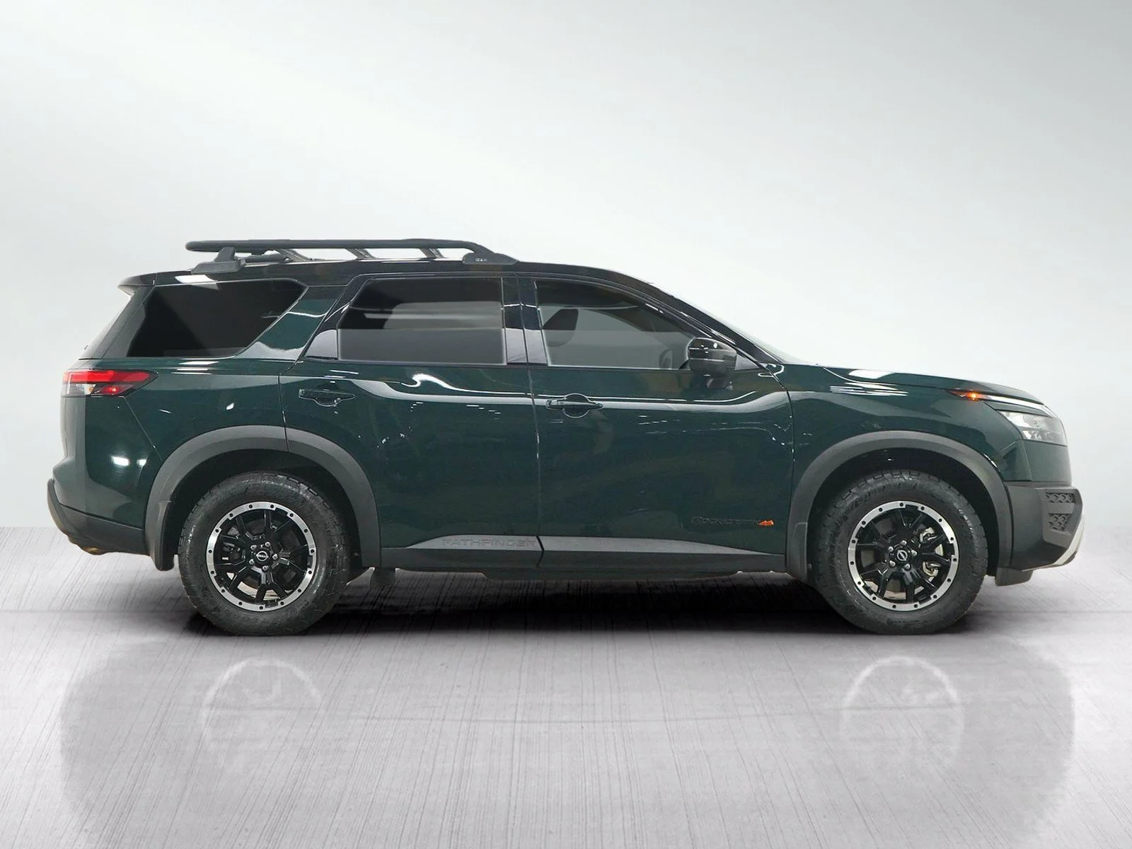 Used 2024 Obsidian Green Pearl/Super Black Nissan Rock Creek image 6