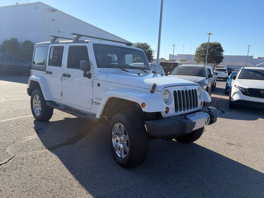 Used 2013 White Jeep Unlimited Sahara image 6