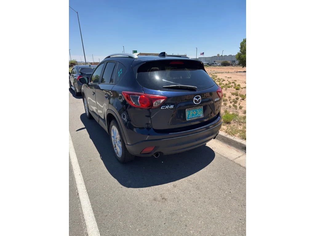 Used 2015 Mazda CX-5 Grand Touring with VIN JM3KE2DY2F0526975 for sale in Santa Fe, NM