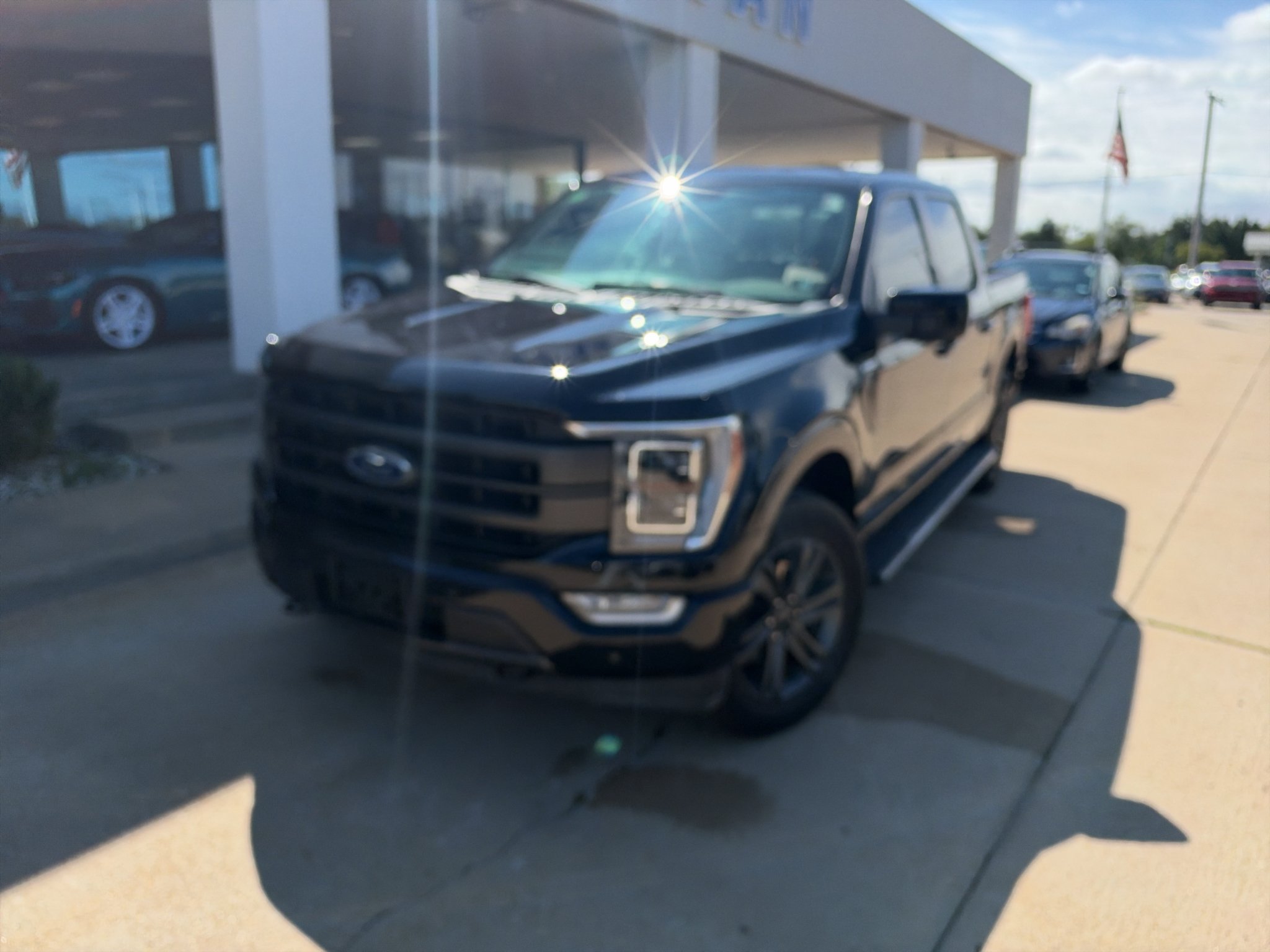 Used 2023 Agate Black Metallic Ford LARIAT image 2