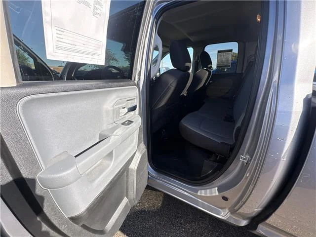 Used 2024 Granite Crystal Metallic Clearcoat RAM SLT 4x4 Quad Cab 6.3 ft. box 140 in. WB image 11