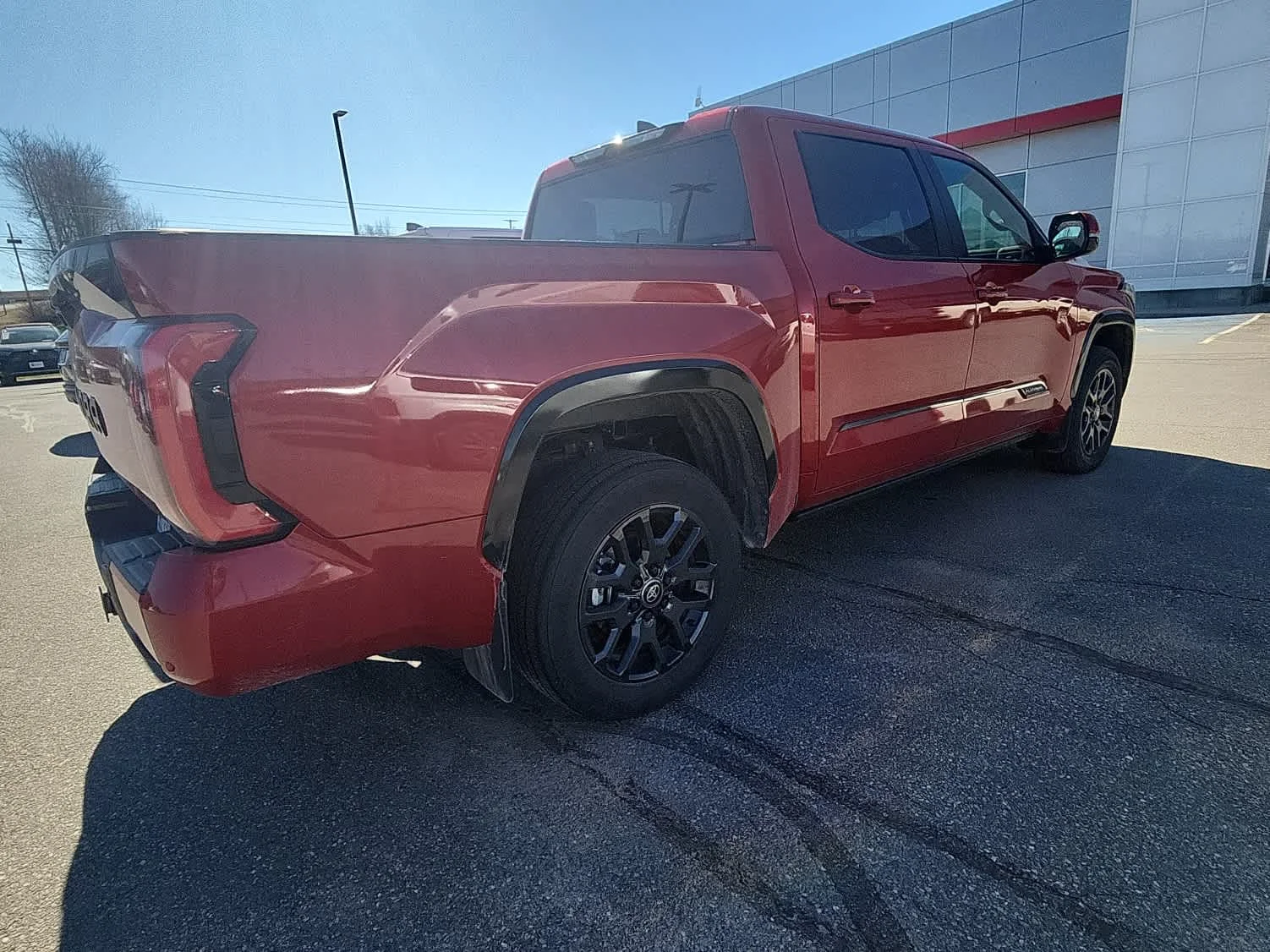 Used 2025 Supersonic Red Toyota Platinum image 4