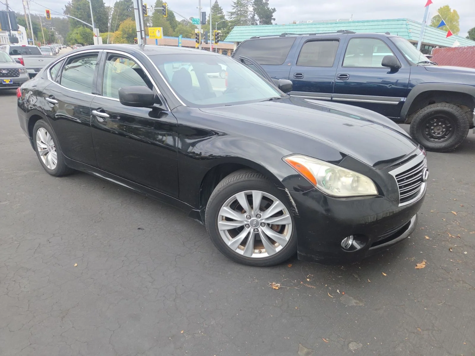Used 2011 Black Obsidian INFINITI Base image 1
