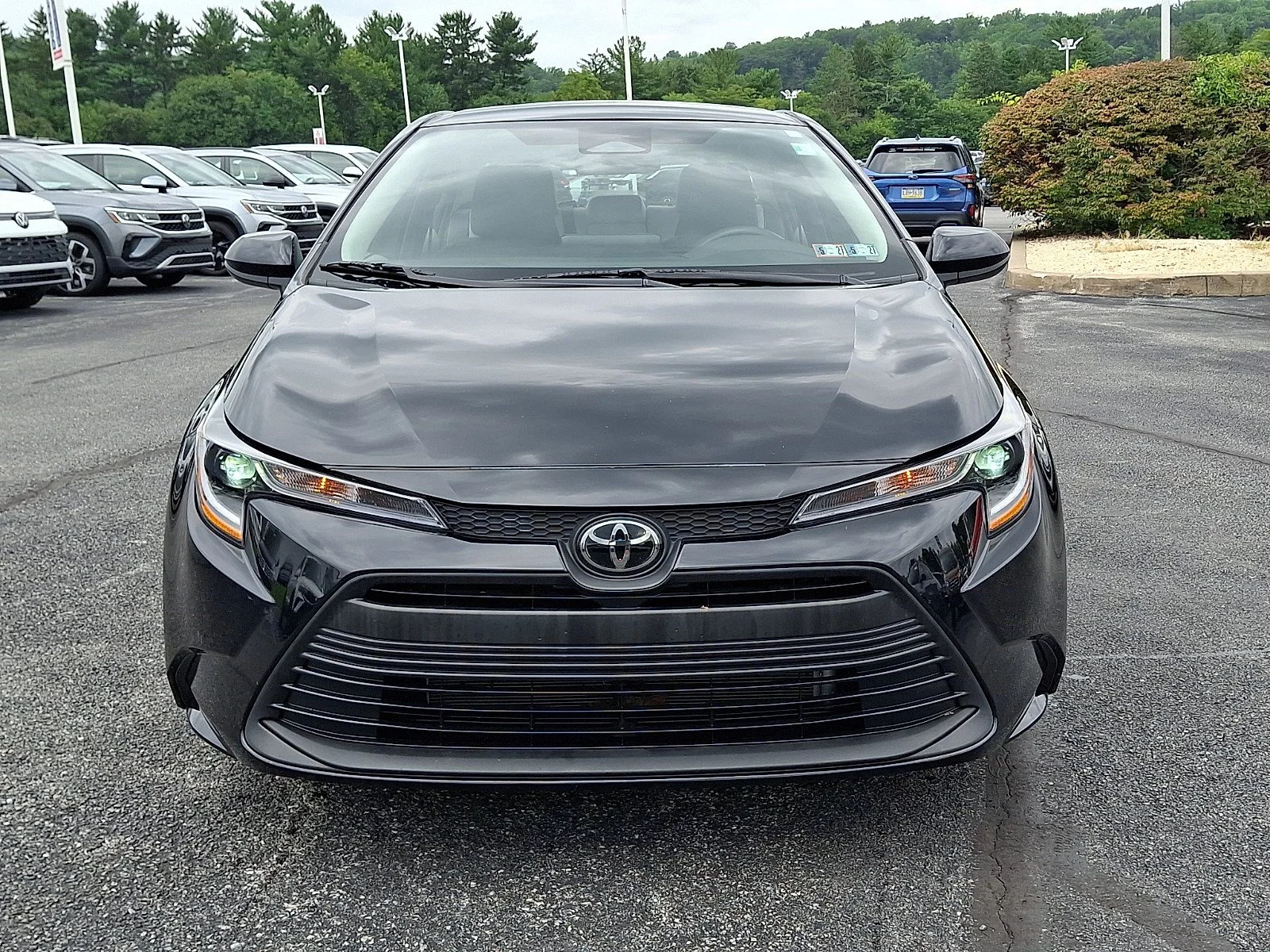 Used 2025 Midnight Black Metallic   218 Toyota LE image 2