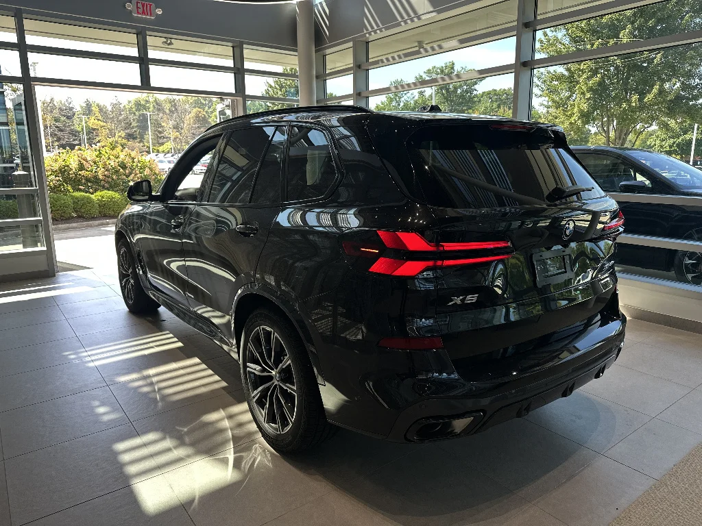 New 2026 Black Sapphire Metallic BMW xDrive50e image 4