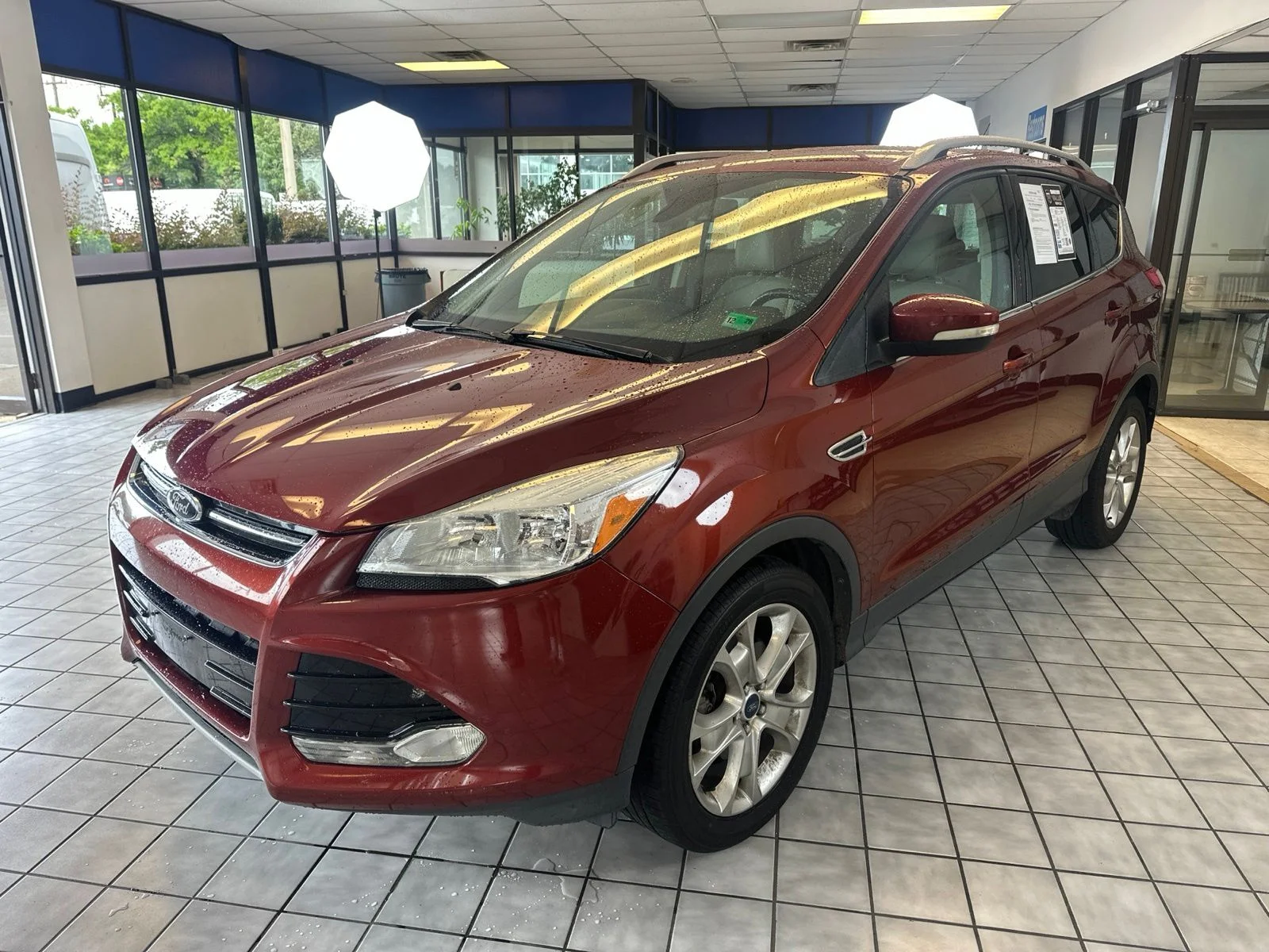 Used 2016 Orange Ford Titanium image 3