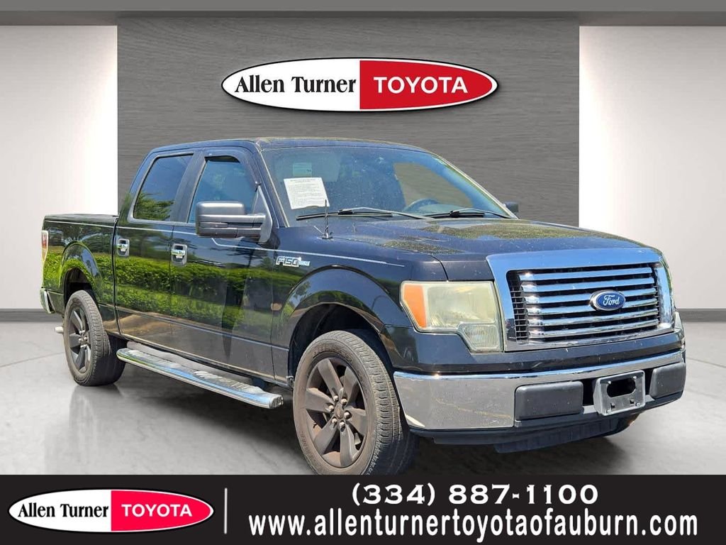 Used 2010 Black Ford XLT image 1